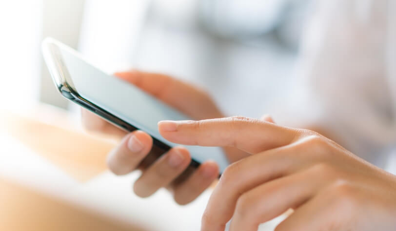 business-hand-with-mobile-phone